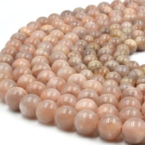 Shop Moonstone Round Beads! Large Hole Peach Moonstone Beads | Peach Moonstone Smooth Round Shaped Beads with 2mm Holes | 7.5" Strand | 8mm 10mm Available | Natural genuine round Moonstone beads for beading and jewelry making.  #jewelry #beads #beadedjewelry #diyjewelry #jewelrymaking #beadstore #beading #affiliate #ad