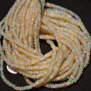 Shop Opal Rondelle Beads! 16 Inches 3mm To 3.5mm Natural Ethiopian Welo Opal Beads, Ethiopian Opal Plain Rondelle Beads, Opal Rondelles, G174 | Natural genuine rondelle Opal beads for beading and jewelry making.  #jewelry #beads #beadedjewelry #diyjewelry #jewelrymaking #beadstore #beading #affiliate #ad