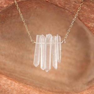Shop Quartz Crystal Necklaces! Crystal bar necklace – quartz necklace – raw crystal necklace – a row of raw quartz wands wire wrapped onto a 14k gold vermeil chain | Natural genuine Quartz necklaces. Buy crystal jewelry, handmade handcrafted artisan jewelry for women.  Unique handmade gift ideas. #jewelry #beadednecklaces #beadedjewelry #gift #shopping #handmadejewelry #fashion #style #product #necklaces #affiliate #ad