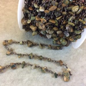 Gunmetal Plated Copper Rosary Chain with 4-8mm Rhyolite Chip Beads – Sold by the Foot, or in Bulk! – Natural Semi-Precious Beaded Chain | Natural genuine chip Rainforest Jasper beads for beading and jewelry making.  #jewelry #beads #beadedjewelry #diyjewelry #jewelrymaking #beadstore #beading #affiliate #ad