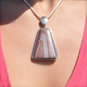 Marching Penguin Rhyolite Pendant // Rhyolite Jewelry // Sterling Silver // Village Silversmith | Natural genuine Rainforest Jasper pendants. Buy crystal jewelry, handmade handcrafted artisan jewelry for women.  Unique handmade gift ideas. #jewelry #beadedpendants #beadedjewelry #gift #shopping #handmadejewelry #fashion #style #product #pendants #affiliate #ad