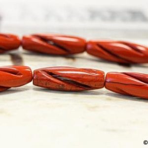 Shop Red Jasper Beads! M/ Red Jasper 8x25mm Carved Oval  Length 15.5" long  Polished not dyed red Jasper semi precious gemstone wholesale beads Special Cut | Natural genuine beads Red Jasper beads for beading and jewelry making.  #jewelry #beads #beadedjewelry #diyjewelry #jewelrymaking #beadstore #beading #affiliate #ad