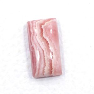 Shop Rhodochrosite Cabochons! AAA+++ Pink Rhodochrosite with White Streaks- 10*19 MM Octagon Shape 13.70 Ct Flat Back Cabochon- Heart Chakra Zodiac Stone For Leo /Scorpio | Natural genuine stones & crystals in various shapes & sizes. Buy raw cut, tumbled, or polished gemstones for making jewelry or crystal healing energy vibration raising reiki stones. #crystals #gemstones #crystalhealing #crystalsandgemstones #energyhealing #affiliate #ad