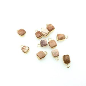 Shop Rhodochrosite Faceted Beads! Gold Finish Faceted Rhodochrosite Cube/Square Shape Plated Copper Bezel Charm/Drop – Measures 7-8mm – Natural Gemstone – Sold Individually | Natural genuine faceted Rhodochrosite beads for beading and jewelry making.  #jewelry #beads #beadedjewelry #diyjewelry #jewelrymaking #beadstore #beading #affiliate #ad