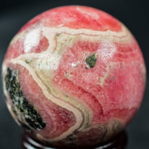 Shop Rhodochrosite Stones & Crystals! Rhodochrosite Sphere from Argentina  1.6" in diameter weighs 102 grams | Natural genuine stones & crystals in various shapes & sizes. Buy raw cut, tumbled, or polished gemstones for making jewelry or crystal healing energy vibration raising reiki stones. #crystals #gemstones #crystalhealing #crystalsandgemstones #energyhealing #affiliate #ad