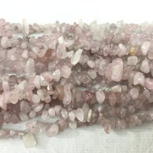Shop Rose Quartz Chip & Nugget Beads! Natural Madagascar Rose Quartz 5-8mm Chips Genuine Gemstone Loose Nugget Beads 34 inch Jewelry Supply Bracelet Necklace Material Wholesale | Natural genuine chip Rose Quartz beads for beading and jewelry making.  #jewelry #beads #beadedjewelry #diyjewelry #jewelrymaking #beadstore #beading #affiliate #ad