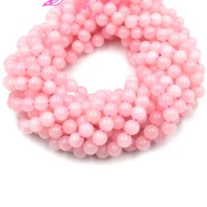 Shop Rose Quartz Round Beads! Rose Quartz Beads | Smooth Round Beads | 4mm 6mm 8mm 10mm 12mm | Loose Gemstone Beads | Beads by the Strand | Natural genuine round Rose Quartz beads for beading and jewelry making.  #jewelry #beads #beadedjewelry #diyjewelry #jewelrymaking #beadstore #beading #affiliate #ad