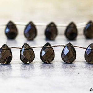 Shop Smoky Quartz Bead Shapes! M/ Smoky Quartz 10x14mm/ 9x11mm/ 8x10mm Flat Pear Briolette Beads 15.5" strand Enhanced brown quartz gemstone beads For jewelry making | Natural genuine other-shape Smoky Quartz beads for beading and jewelry making.  #jewelry #beads #beadedjewelry #diyjewelry #jewelrymaking #beadstore #beading #affiliate #ad