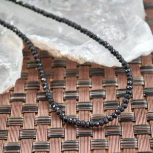 Shop Spinel Necklaces! Black Faceted Spinel Beaded Necklace // Spinel Beaded Necklace // Black Spinel Necklace // Beaded Necklace // Village Silversmith | Natural genuine Spinel necklaces. Buy crystal jewelry, handmade handcrafted artisan jewelry for women.  Unique handmade gift ideas. #jewelry #beadednecklaces #beadedjewelry #gift #shopping #handmadejewelry #fashion #style #product #necklaces #affiliate #ad