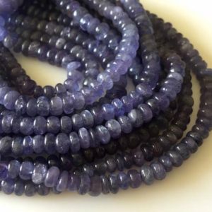 Shop Tanzanite Rondelle Beads! Natural Tanzanite Smooth Rondelle Beads, 5mm To 8mm Blue Tanzanite Beads, 18 Inch Strand, GDS815 | Natural genuine rondelle Tanzanite beads for beading and jewelry making.  #jewelry #beads #beadedjewelry #diyjewelry #jewelrymaking #beadstore #beading #affiliate #ad