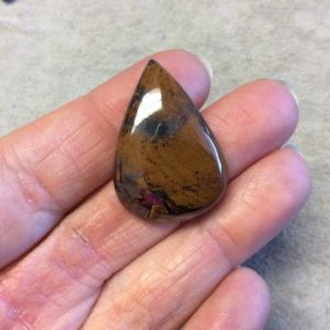 Shop Tiger Iron Stones & Crystals! Single OOAK Natural Tiger Iron Teardrop/Pear Shaped Flat Back Cabochon – Measuring 23mm x 32mm, 6mm Dome Height – High Quality Gemstone | Natural genuine stones & crystals in various shapes & sizes. Buy raw cut, tumbled, or polished gemstones for making jewelry or crystal healing energy vibration raising reiki stones. #crystals #gemstones #crystalhealing #crystalsandgemstones #energyhealing #affiliate #ad