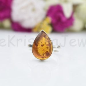 Shop Amber Rings! Natural Amber Ring, Sterling Silver Ring, Pear Shape Ring, Statement Ring, Bezel Set Ring, Cabochon Gemstone Ring, Simple Band Ring, Boho | Natural genuine Amber rings, simple unique handcrafted gemstone rings. #rings #jewelry #shopping #gift #handmade #fashion #style #affiliate #ad