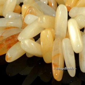 Shop Jade Chip & Nugget Beads! Golden Honey Jade Gemstones Stick Pebble Chip 23X8MM Loose Beads 7.5 inch Half Strand (90108505-106) | Natural genuine chip Jade beads for beading and jewelry making.  #jewelry #beads #beadedjewelry #diyjewelry #jewelrymaking #beadstore #beading #affiliate #ad