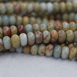 Shop Jasper Rondelle Beads! 15" 5x8mm Blue Aqua Terra Jasper roundel beads, blue African opal beads, blue impression jasper rondelle beads, shoushan stone FGMO | Natural genuine rondelle Jasper beads for beading and jewelry making.  #jewelry #beads #beadedjewelry #diyjewelry #jewelrymaking #beadstore #beading #affiliate #ad