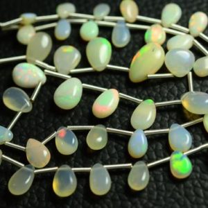Shop Opal Bead Shapes! 15 Inches Strand Natural AA Ethiopian Opal Beads 4x6mm to 6x9mm Smooth Pear Briolettes Gemstone Beads Superb Opal Stone Beads No3598 | Natural genuine other-shape Opal beads for beading and jewelry making.  #jewelry #beads #beadedjewelry #diyjewelry #jewelrymaking #beadstore #beading #affiliate #ad
