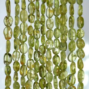 Shop Peridot Chip & Nugget Beads! 6×4-7x5mm Peridot Gemstone Grade A Green Pebble Nugget Loose Beads 14 inch Full Strand (90184956-899) | Natural genuine chip Peridot beads for beading and jewelry making.  #jewelry #beads #beadedjewelry #diyjewelry #jewelrymaking #beadstore #beading #affiliate #ad