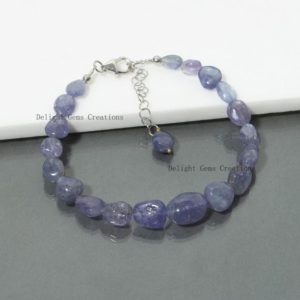 Shop Tanzanite Bracelets! AAA GRADE TANZANITE Smooth Tumble Beaded Bracelet-7.5"+2 Inches Extension Chain-Tanzanite Beads Bracelet Gemstone Tanzanite Beads Jewelry | Natural genuine Tanzanite bracelets. Buy crystal jewelry, handmade handcrafted artisan jewelry for women.  Unique handmade gift ideas. #jewelry #beadedbracelets #beadedjewelry #gift #shopping #handmadejewelry #fashion #style #product #bracelets #affiliate #ad