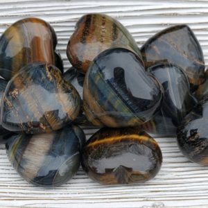 Shop Tiger Eye Shapes! Blue Tiger Eye Heart Stones for Strength and Courage, Tiger's Eye Crystals for Relieving Stress, Calming Stone, Protection and Healing Stone | Natural genuine stones & crystals in various shapes & sizes. Buy raw cut, tumbled, or polished gemstones for making jewelry or crystal healing energy vibration raising reiki stones. #crystals #gemstones #crystalhealing #crystalsandgemstones #energyhealing #affiliate #ad