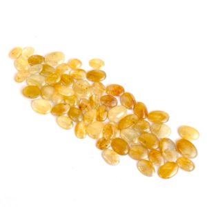 Shop Yellow Sapphire Stones & Crystals! 56 Pc Natural Burmese Precious Yellow Sapphire Chip Flat Cabochons | Polished Beautiful Cabs | 142 Carats | 7×9 to 11×14 mm | Natural genuine stones & crystals in various shapes & sizes. Buy raw cut, tumbled, or polished gemstones for making jewelry or crystal healing energy vibration raising reiki stones. #crystals #gemstones #crystalhealing #crystalsandgemstones #energyhealing #affiliate #ad