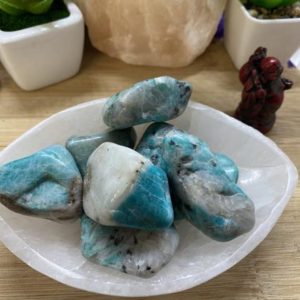 Shop Tumbled Amazonite Crystals & Pocket Stones! Tumbled Amazonite Pebbles Stones | Natural genuine stones & crystals in various shapes & sizes. Buy raw cut, tumbled, or polished gemstones for making jewelry or crystal healing energy vibration raising reiki stones. #crystals #gemstones #crystalhealing #crystalsandgemstones #energyhealing #affiliate #ad