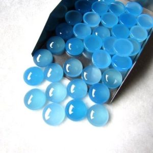 Shop Blue Chalcedony Stones & Crystals! 12mm Blue Chalcedony Round cabochon AAA Quality gemstone, Blue Chalcedony Cabochon Round Gemstone | Natural genuine stones & crystals in various shapes & sizes. Buy raw cut, tumbled, or polished gemstones for making jewelry or crystal healing energy vibration raising reiki stones. #crystals #gemstones #crystalhealing #crystalsandgemstones #energyhealing #affiliate #ad