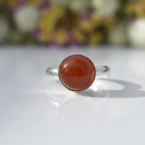 Shop Carnelian Rings! Orange Carnelian Ring, Sterling Silver Ring, Round Stone Ring, Statement Ring, Cabochon Gemstone, Silver Band Ring, Natural Gemstone, Boho | Natural genuine Carnelian rings, simple unique handcrafted gemstone rings. #rings #jewelry #shopping #gift #handmade #fashion #style #affiliate #ad