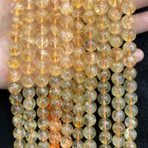 Shop Citrine Round Beads! Genuine Citrine Beads, Natural Gemstone Beads, Round Quartz Stone Beads 4mm 6mm 8mm 10mm 15'' | Natural genuine round Citrine beads for beading and jewelry making.  #jewelry #beads #beadedjewelry #diyjewelry #jewelrymaking #beadstore #beading #affiliate #ad