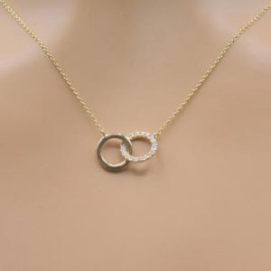 Shop Diamond Necklaces! Interlocking Circle necklace in 14kt Gold | Double circle | Layering Diamond Necklace | Bridesmaid gift | April Birthstone | Dainty jewelry | Natural genuine Diamond necklaces. Buy crystal jewelry, handmade handcrafted artisan jewelry for women.  Unique handmade gift ideas. #jewelry #beadednecklaces #beadedjewelry #gift #shopping #handmadejewelry #fashion #style #product #necklaces #affiliate #ad