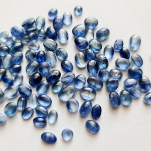 Shop Kyanite Cabochons! 6x4mm-8x6mm Kyanite Plain Cabochons, Natural Kyanite Oval Flat Back Cabochons For Jewelry, Loose Kyanite (5 Pcs To 10 Pcs Options) – PSG140 | Natural genuine stones & crystals in various shapes & sizes. Buy raw cut, tumbled, or polished gemstones for making jewelry or crystal healing energy vibration raising reiki stones. #crystals #gemstones #crystalhealing #crystalsandgemstones #energyhealing #affiliate #ad