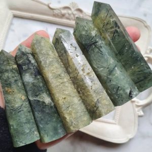 Shop Prehnite Stones & Crystals! Large Prehnite points, High quality Prehnite towers, your choice. | Natural genuine stones & crystals in various shapes & sizes. Buy raw cut, tumbled, or polished gemstones for making jewelry or crystal healing energy vibration raising reiki stones. #crystals #gemstones #crystalhealing #crystalsandgemstones #energyhealing #affiliate #ad