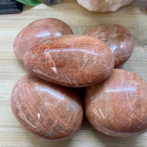 Shop Moonstone Shapes! Gorgeous Peach Moonstone crystal geode palm stone healing gem | Natural genuine stones & crystals in various shapes & sizes. Buy raw cut, tumbled, or polished gemstones for making jewelry or crystal healing energy vibration raising reiki stones. #crystals #gemstones #crystalhealing #crystalsandgemstones #energyhealing #affiliate #ad
