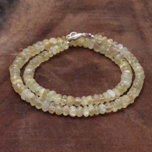 Shop Prehnite Necklaces! Natural Prehnite Faceted Rondelle 5-5.5mm Beaded Necklace, Prehnite Center Drilled Beaded String Necklace-18 Inches Necklace Women Jewelry | Natural genuine Prehnite necklaces. Buy crystal jewelry, handmade handcrafted artisan jewelry for women.  Unique handmade gift ideas. #jewelry #beadednecklaces #beadedjewelry #gift #shopping #handmadejewelry #fashion #style #product #necklaces #affiliate #ad