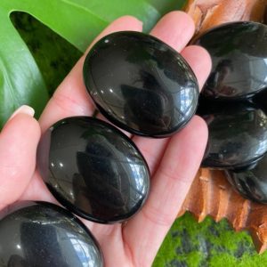 Shop Obsidian Shapes! Small Obsidian palmstone , orb, palm stone, black obsidian | Natural genuine stones & crystals in various shapes & sizes. Buy raw cut, tumbled, or polished gemstones for making jewelry or crystal healing energy vibration raising reiki stones. #crystals #gemstones #crystalhealing #crystalsandgemstones #energyhealing #affiliate #ad