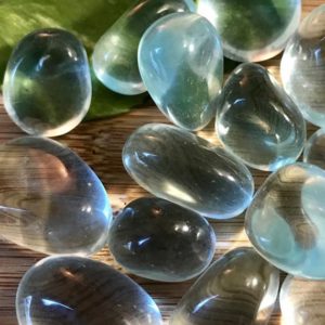 Shop Tumbled Obsidian Crystals & Pocket Stones! Tumbled Blue or Aqua Obsidian Stones Set with Gift Bag and Note | Natural genuine stones & crystals in various shapes & sizes. Buy raw cut, tumbled, or polished gemstones for making jewelry or crystal healing energy vibration raising reiki stones. #crystals #gemstones #crystalhealing #crystalsandgemstones #energyhealing #affiliate #ad