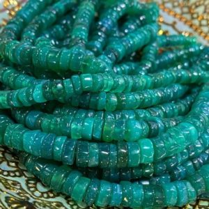Shop Onyx Rondelle Beads! Amazing rustic Green Onyx Tyre Heishi rondelles beads / Glowy heishi tyre beads 7-8mm | Natural genuine rondelle Onyx beads for beading and jewelry making.  #jewelry #beads #beadedjewelry #diyjewelry #jewelrymaking #beadstore #beading #affiliate #ad