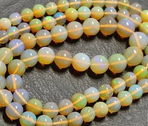 Shop Opal Round Beads! Hand Knotted Multicolor Opal Necklace,Peruvian Opal Multicolor Knotted Necklace,Opal Knotted Necklace,Opal Candy Necklace,Handmade Jewelry | Natural genuine round Opal beads for beading and jewelry making.  #jewelry #beads #beadedjewelry #diyjewelry #jewelrymaking #beadstore #beading #affiliate #ad