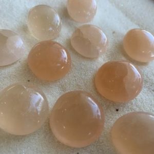 Shop Tumbled Selenite Crystals & Pocket Stones! Peach Selenite Tumbled Stone, Peach Selenite Tumble | Natural genuine stones & crystals in various shapes & sizes. Buy raw cut, tumbled, or polished gemstones for making jewelry or crystal healing energy vibration raising reiki stones. #crystals #gemstones #crystalhealing #crystalsandgemstones #energyhealing #affiliate #ad