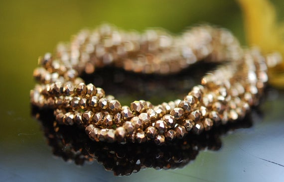 1/2 Strand Of Gold Plated Pyrite Roundels