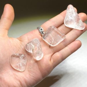 Shop Tumbled Quartz Crystals & Pocket Stones! Clear Quartz Tumbled Stone | Natural genuine stones & crystals in various shapes & sizes. Buy raw cut, tumbled, or polished gemstones for making jewelry or crystal healing energy vibration raising reiki stones. #crystals #gemstones #crystalhealing #crystalsandgemstones #energyhealing #affiliate #ad