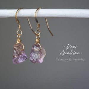 Raw Ametrine Earrings • Amethyst Citrine Birthstone • Raw Crystal Earrings • February and November Birthstone | Natural genuine Ametrine earrings. Buy crystal jewelry, handmade handcrafted artisan jewelry for women.  Unique handmade gift ideas. #jewelry #beadedearrings #beadedjewelry #gift #shopping #handmadejewelry #fashion #style #product #earrings #affiliate #ad