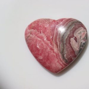 Shop Tumbled Rhodochrosite Crystals & Pocket Stones! Rhodochrosite Heart stone, pink patterns patterned, Natural Gem Pocket Stone, Polished Tumbled Pink Gemmy Crystal, Weight-53 grams. | Natural genuine stones & crystals in various shapes & sizes. Buy raw cut, tumbled, or polished gemstones for making jewelry or crystal healing energy vibration raising reiki stones. #crystals #gemstones #crystalhealing #crystalsandgemstones #energyhealing #affiliate #ad