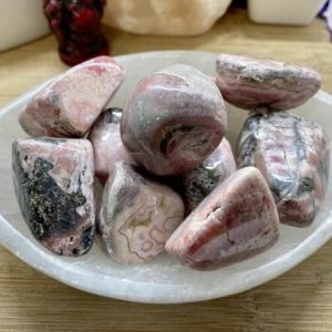 Shop Tumbled Rhodochrosite Crystals & Pocket Stones! Premium large tumbled Rhodochrosite Stone Gift Bag | Natural genuine stones & crystals in various shapes & sizes. Buy raw cut, tumbled, or polished gemstones for making jewelry or crystal healing energy vibration raising reiki stones. #crystals #gemstones #crystalhealing #crystalsandgemstones #energyhealing #affiliate #ad
