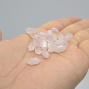 Shop Rose Quartz Points & Wands! High Quality Grade A Natural Rose Quartz Semi-Precious Gemstone Double Terminated Points –  1.2cm, 1.7cm, 2cm sizes – 1 or 5 count | Natural genuine stones & crystals in various shapes & sizes. Buy raw cut, tumbled, or polished gemstones for making jewelry or crystal healing energy vibration raising reiki stones. #crystals #gemstones #crystalhealing #crystalsandgemstones #energyhealing #affiliate #ad