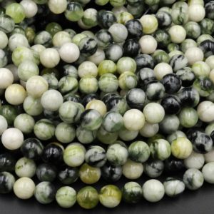 Shop Serpentine Round Beads! Natural Variegated Green Serpentine Jade Round Beads 4mm 6mm 8mm 10mm Gemmy Natural Jade 15.5" Strand | Natural genuine round Serpentine beads for beading and jewelry making.  #jewelry #beads #beadedjewelry #diyjewelry #jewelrymaking #beadstore #beading #affiliate #ad