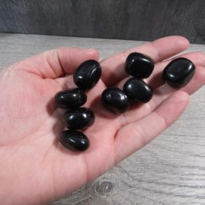 Shop Tumbled Shungite Crystals & Pocket Stones! Shungite Small Tumbled Stone T191 | Natural genuine stones & crystals in various shapes & sizes. Buy raw cut, tumbled, or polished gemstones for making jewelry or crystal healing energy vibration raising reiki stones. #crystals #gemstones #crystalhealing #crystalsandgemstones #energyhealing #affiliate #ad