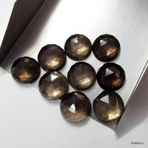 Shop Smoky Quartz Cabochons! 10mm Smoky Quartz Rose Cut Round Cabochon, smoky quartz Round Rose cut faceted cabochon, Smoky Quartz Cabochon Round Rose cut Gemstone | Natural genuine stones & crystals in various shapes & sizes. Buy raw cut, tumbled, or polished gemstones for making jewelry or crystal healing energy vibration raising reiki stones. #crystals #gemstones #crystalhealing #crystalsandgemstones #energyhealing #affiliate #ad