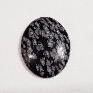 Shop Snowflake Obsidian Cabochons! Snowflake Obsidian Cabochon, Natural Black and Gray Oval Shaped Cab | Natural genuine stones & crystals in various shapes & sizes. Buy raw cut, tumbled, or polished gemstones for making jewelry or crystal healing energy vibration raising reiki stones. #crystals #gemstones #crystalhealing #crystalsandgemstones #energyhealing #affiliate #ad