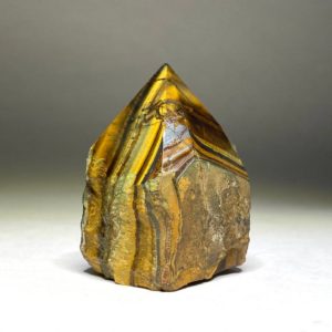 Shop Tiger Eye Stones & Crystals! Tiger Eye Polished Point -Mini | Natural genuine stones & crystals in various shapes & sizes. Buy raw cut, tumbled, or polished gemstones for making jewelry or crystal healing energy vibration raising reiki stones. #crystals #gemstones #crystalhealing #crystalsandgemstones #energyhealing #affiliate #ad