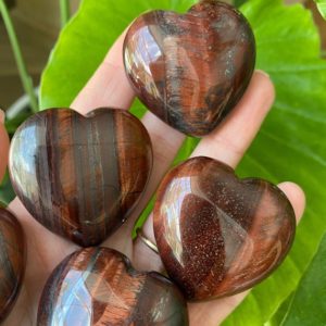 Shop Tiger Eye Shapes! Red Tiger eye heart, Red crystal Heart, protection stone, strength, courage, luck | Natural genuine stones & crystals in various shapes & sizes. Buy raw cut, tumbled, or polished gemstones for making jewelry or crystal healing energy vibration raising reiki stones. #crystals #gemstones #crystalhealing #crystalsandgemstones #energyhealing #affiliate #ad