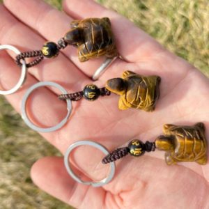 Shop Tiger Eye Stones & Crystals! Tigers Eye Crystal Turtle Key Chain – Hand Carved Turtle – Turtle Gift – Polished Turtle Figurine – Turtle Carving – Miniature Turtle | Natural genuine stones & crystals in various shapes & sizes. Buy raw cut, tumbled, or polished gemstones for making jewelry or crystal healing energy vibration raising reiki stones. #crystals #gemstones #crystalhealing #crystalsandgemstones #energyhealing #affiliate #ad